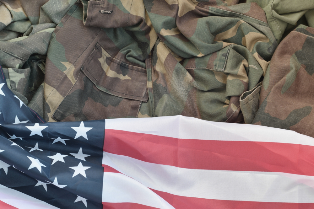united-states-of-america-flag-and-folded-military-2023-11-27-04-53-37-utc